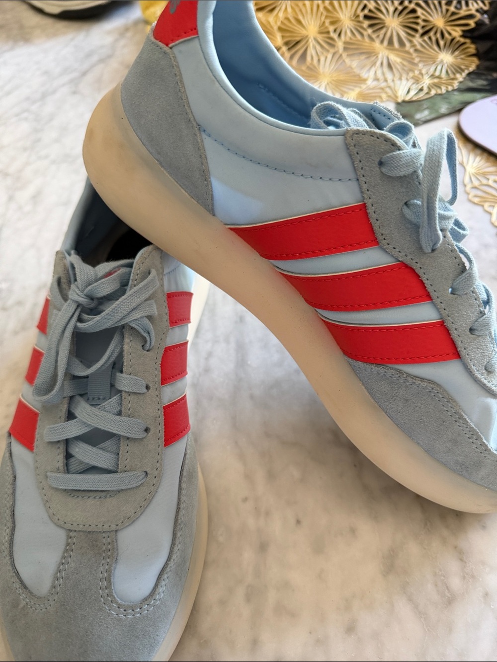 adidas light blue sneakers with coral red accents